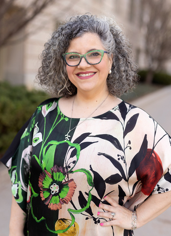 Professional headshot of Lucy Santos Green