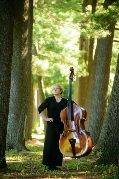 A photograph of Andi Beckendorf and her cello