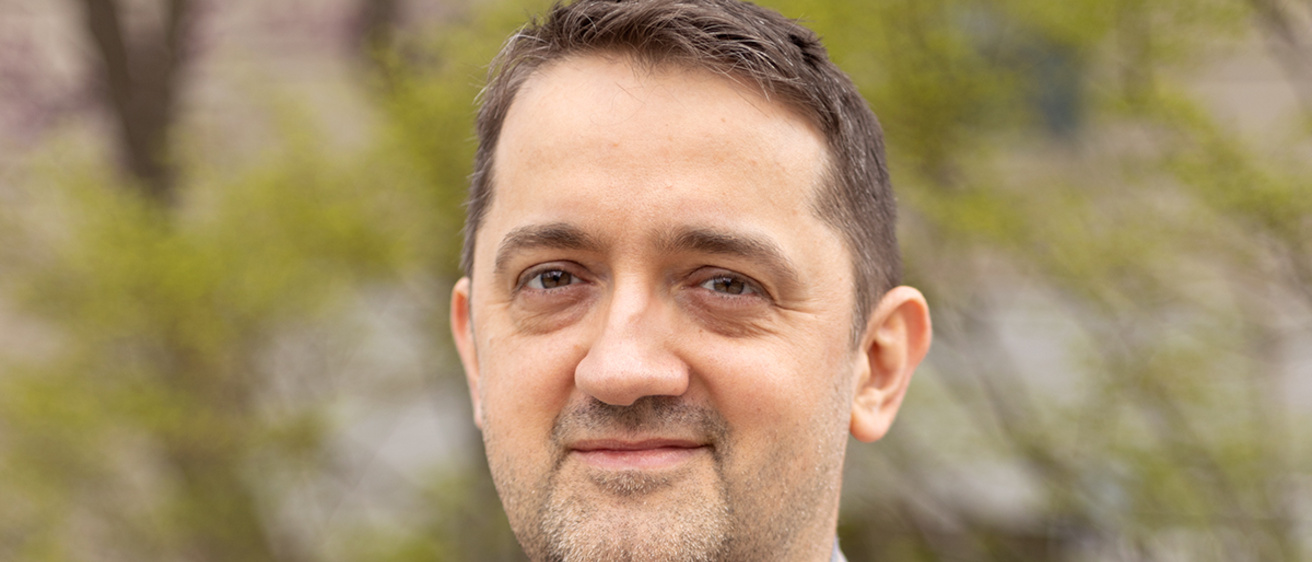 Professional headshot of Iulian Vamanu