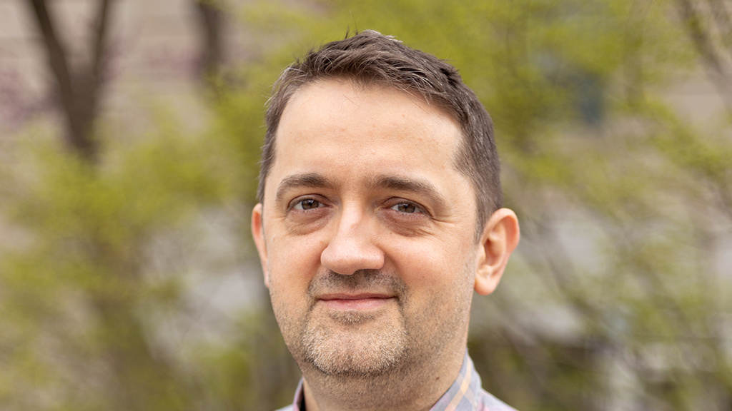 Professional headshot of Iulian Vamanu